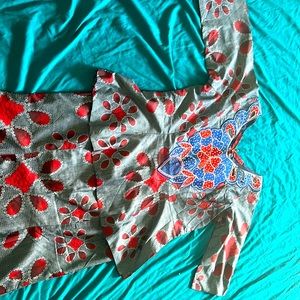 Red and blue traditional African skirt and top